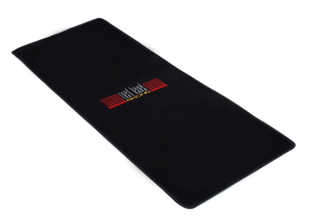 Next Level Racing sim racing floor mat — floor protection and rig stability mat