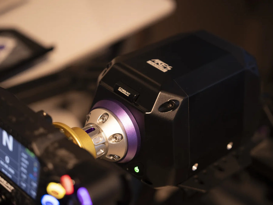 Conspit ARES direct-drive wheelbase with quick release mounted in a sim rig